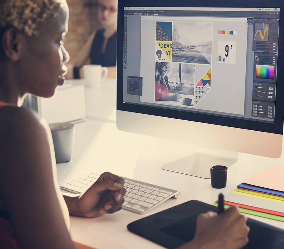 Graphic designer at a computer