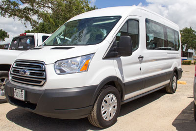 White Ford van with raised roof